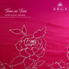 A close-up of a bright pink fabric with tonal floral applique embroidery in a lighter pink or white thread. The text 'Tone on Tone APPLIQUE WORK' appears on the top left, and the brand name 'ARGA' with a floral logo is on the top right.